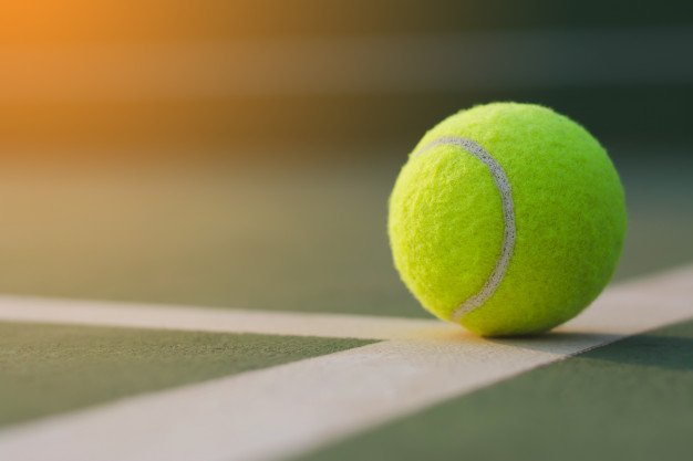 close-up-tennis-ball-courts-background_37074-4
